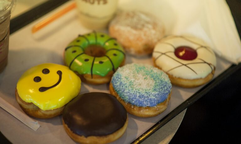 Shallow Focus Photography of Assorted Flavored Donuts